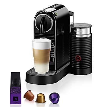 Nespresso machine with outlet milk steamer